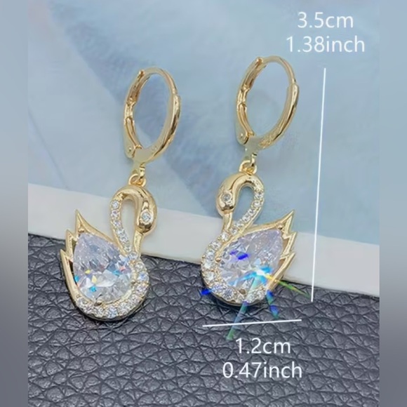 Elegant Gold Swan Earrings - Picture 3 of 4